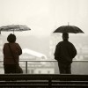 couple umbrellas apart craig allen nocomm flickr